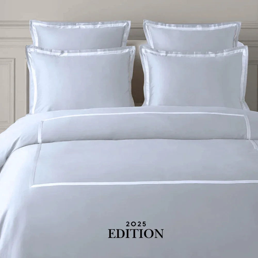 TYPEFACE 4 Luxe 2025 Edition grey sateen bedding with white border, shown without monogram