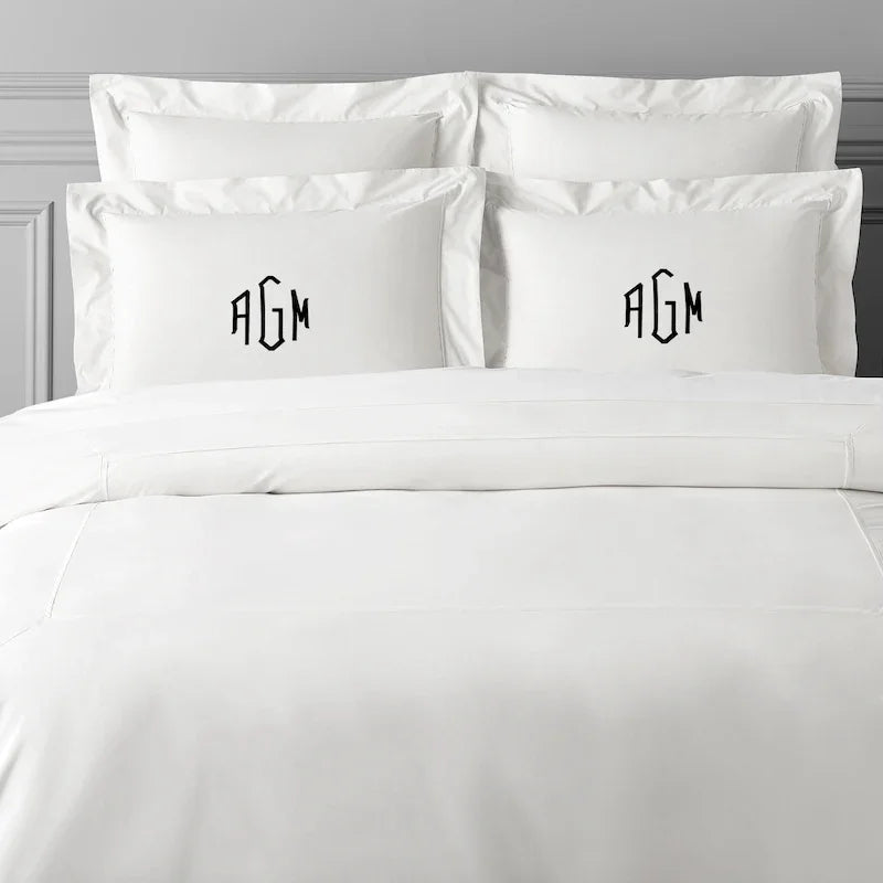 TYPEFACE 5 white 500 TC sateen bedding with black diamond monogram pillowcases