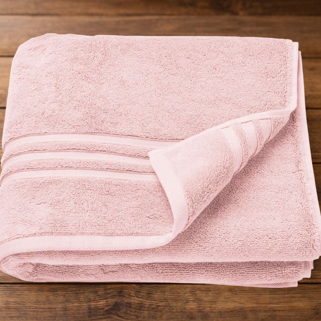 folded blush pink organic cotton bath towel