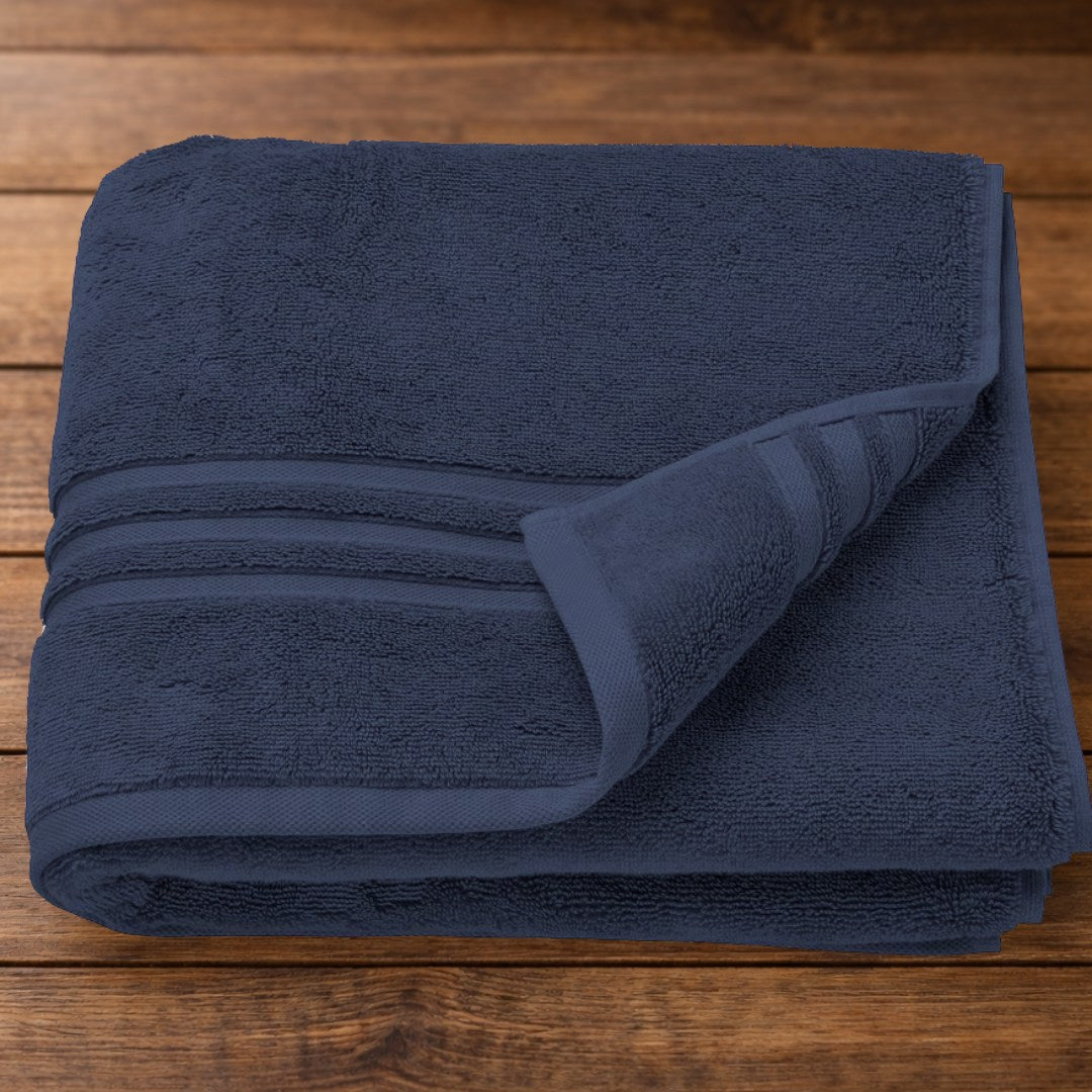 folded navy organic cotton bath towel