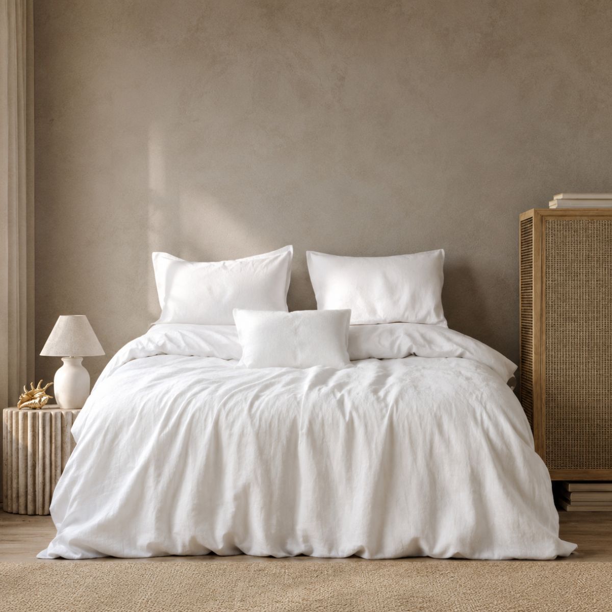 Pearl white linen cotton blend bed sheet set styled on bed — BEDLAM