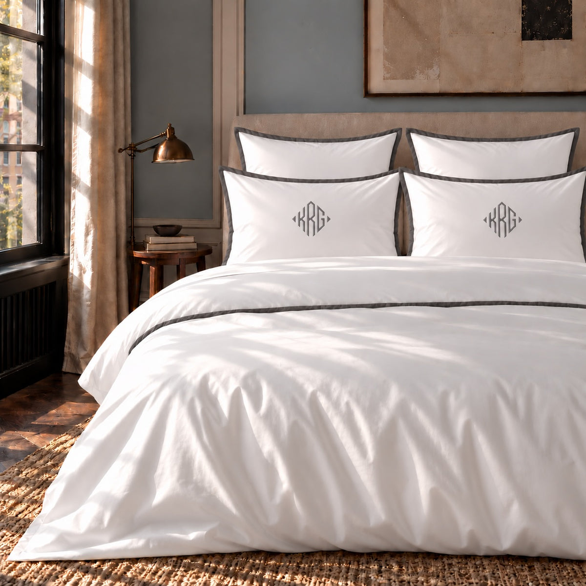 TYPEFACE 1 monogrammed bed sheet set in white 400 TC percale with grey satin border and diamond monogram pillowcases